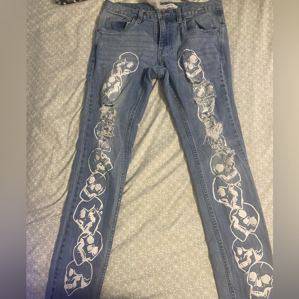 Broken promises distressed jeans